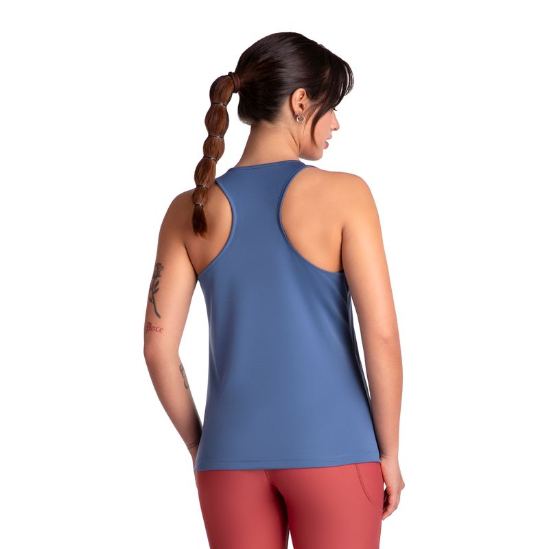 POLERA ESSENTIAL SIN MANGAS AZULADA MUJER